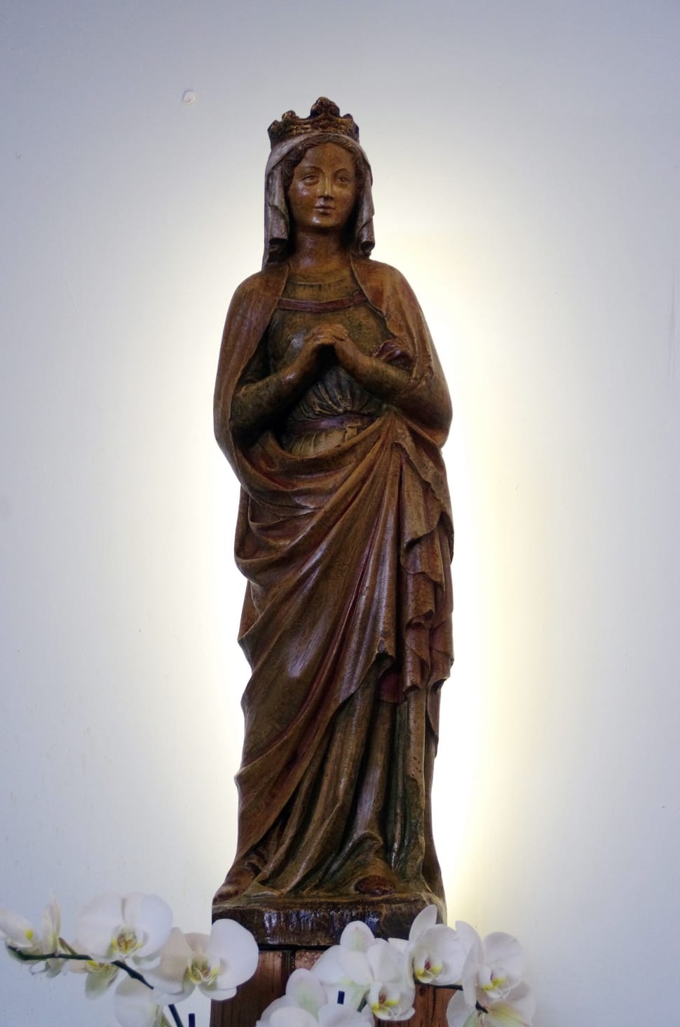 brown wooden religious sculpture preview