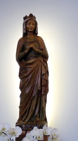 brown wooden religious sculpture thumbnail