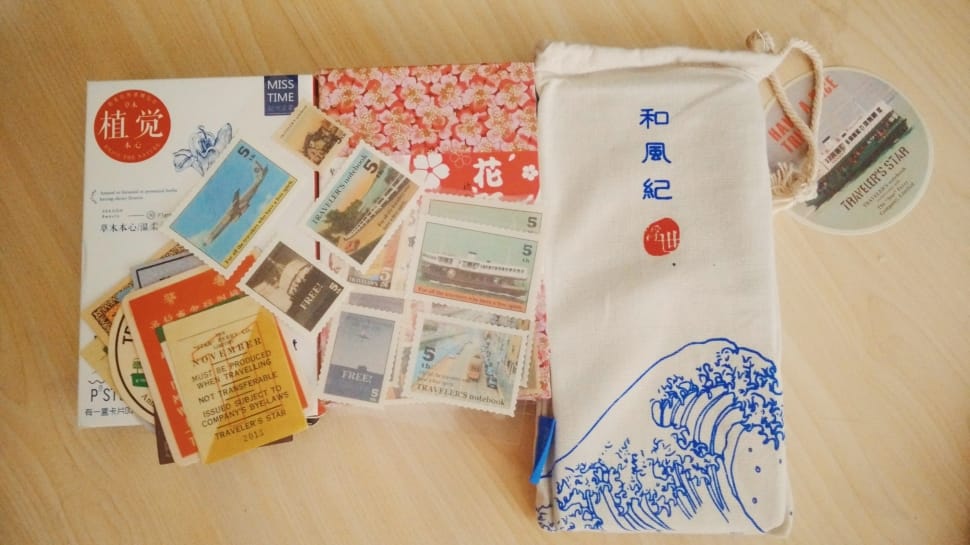 white blue and orange textiles with postage stamps preview