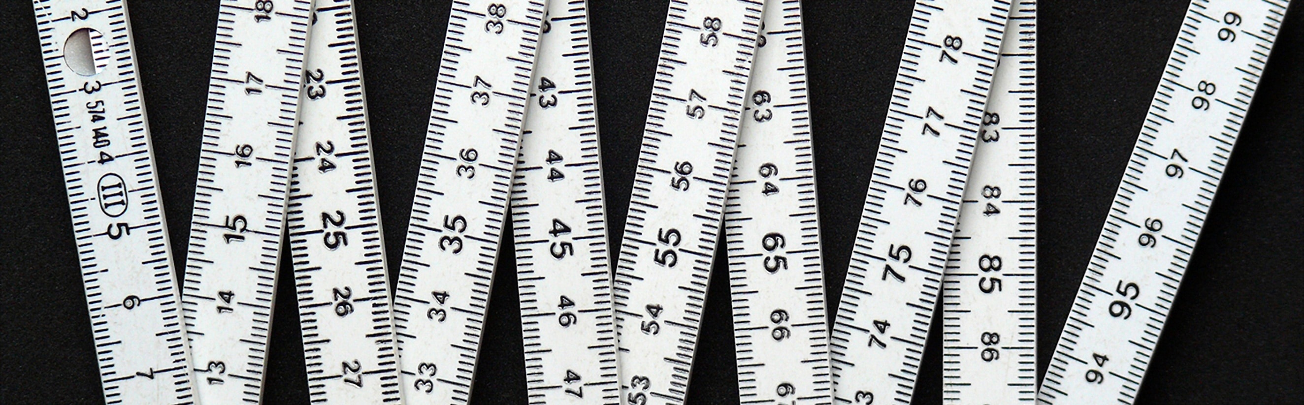 white and black tape measure