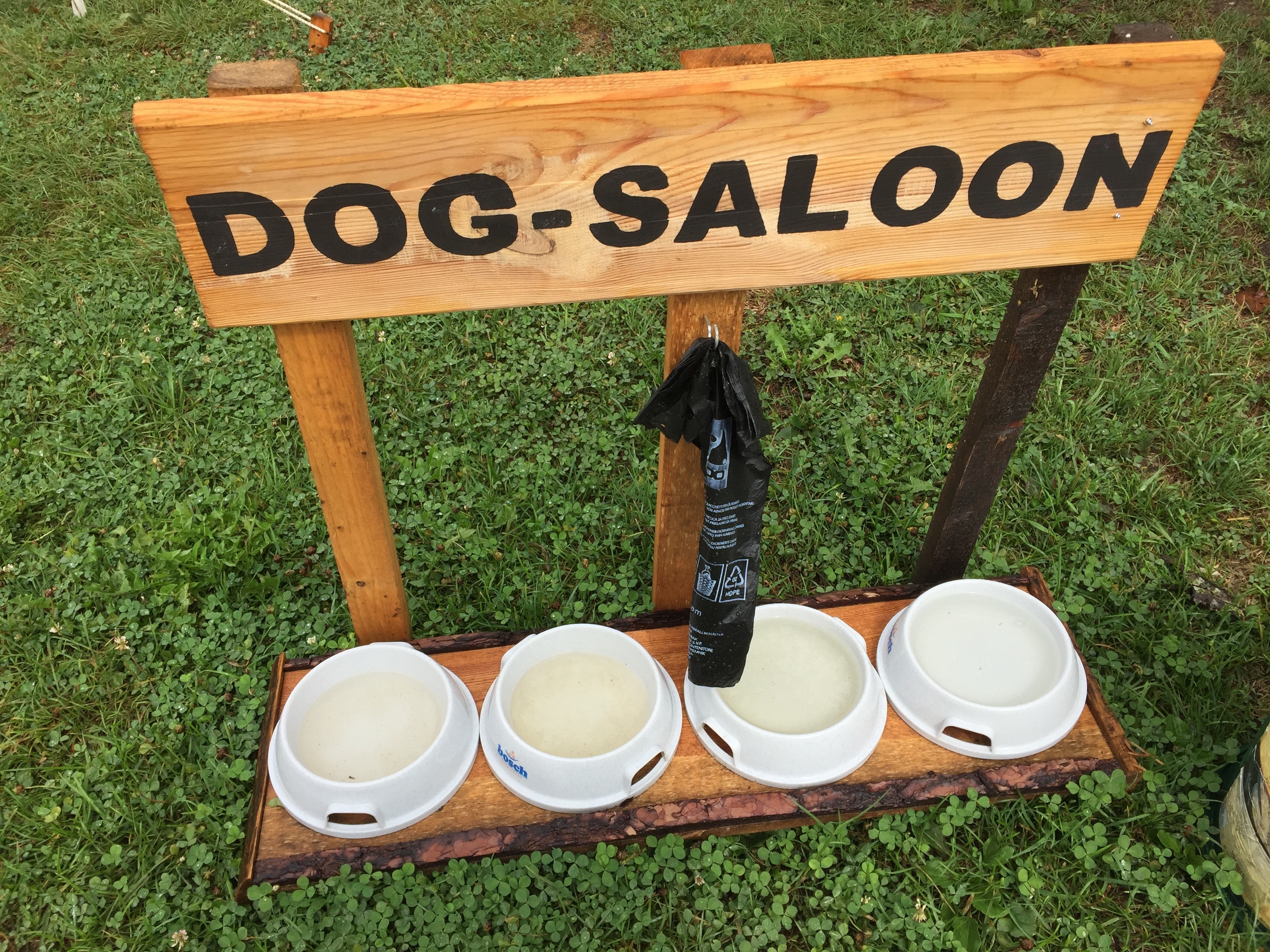 brown wooden dog saloon pet feeder