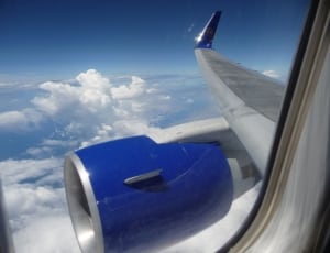 blue and white air plane wing thumbnail