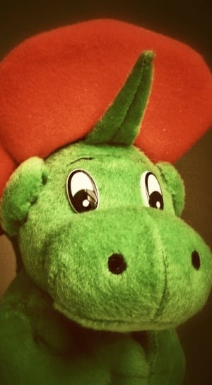 red and green dinosaur plush toy thumbnail