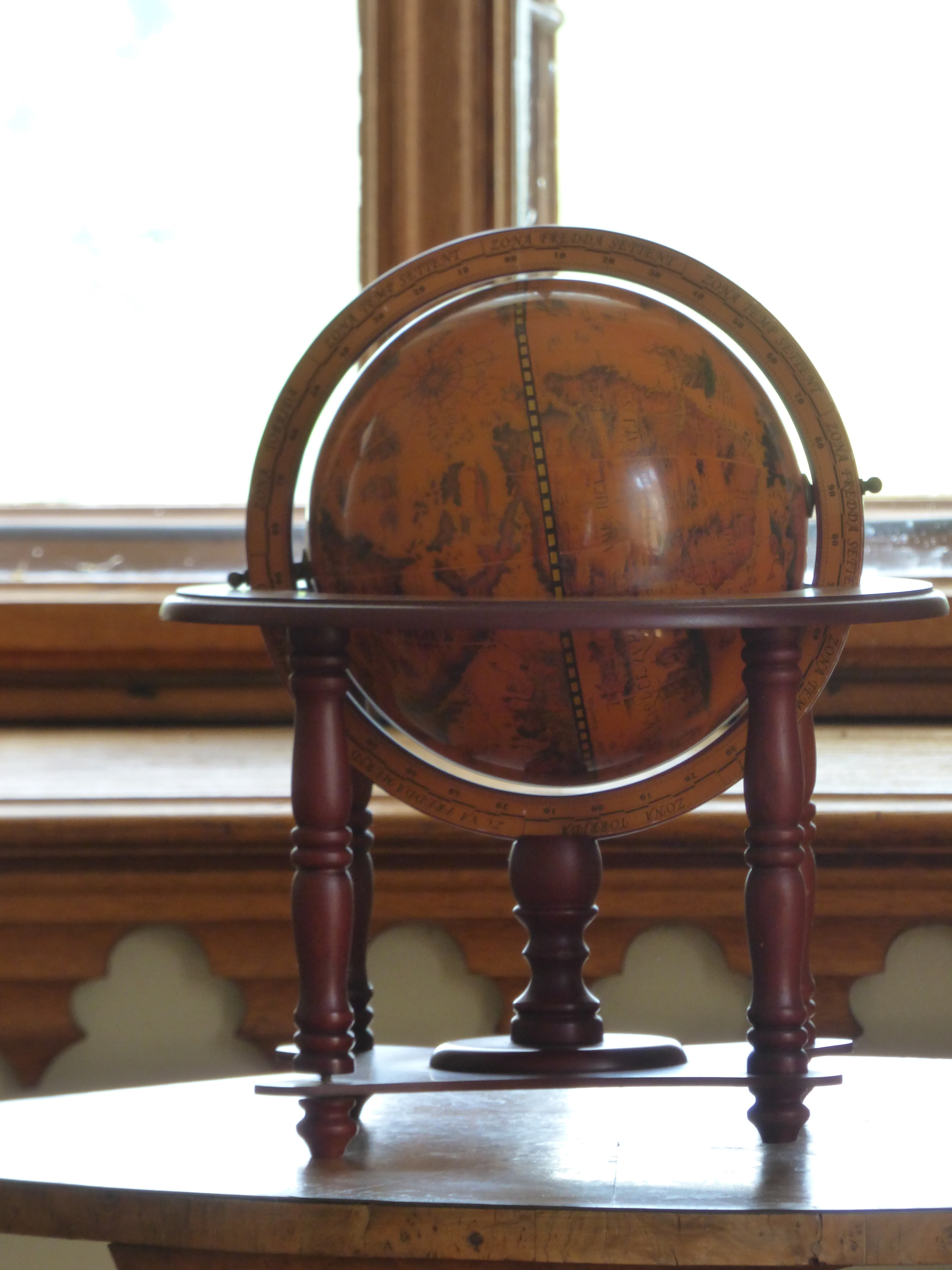 brown wooden terrestrial globe