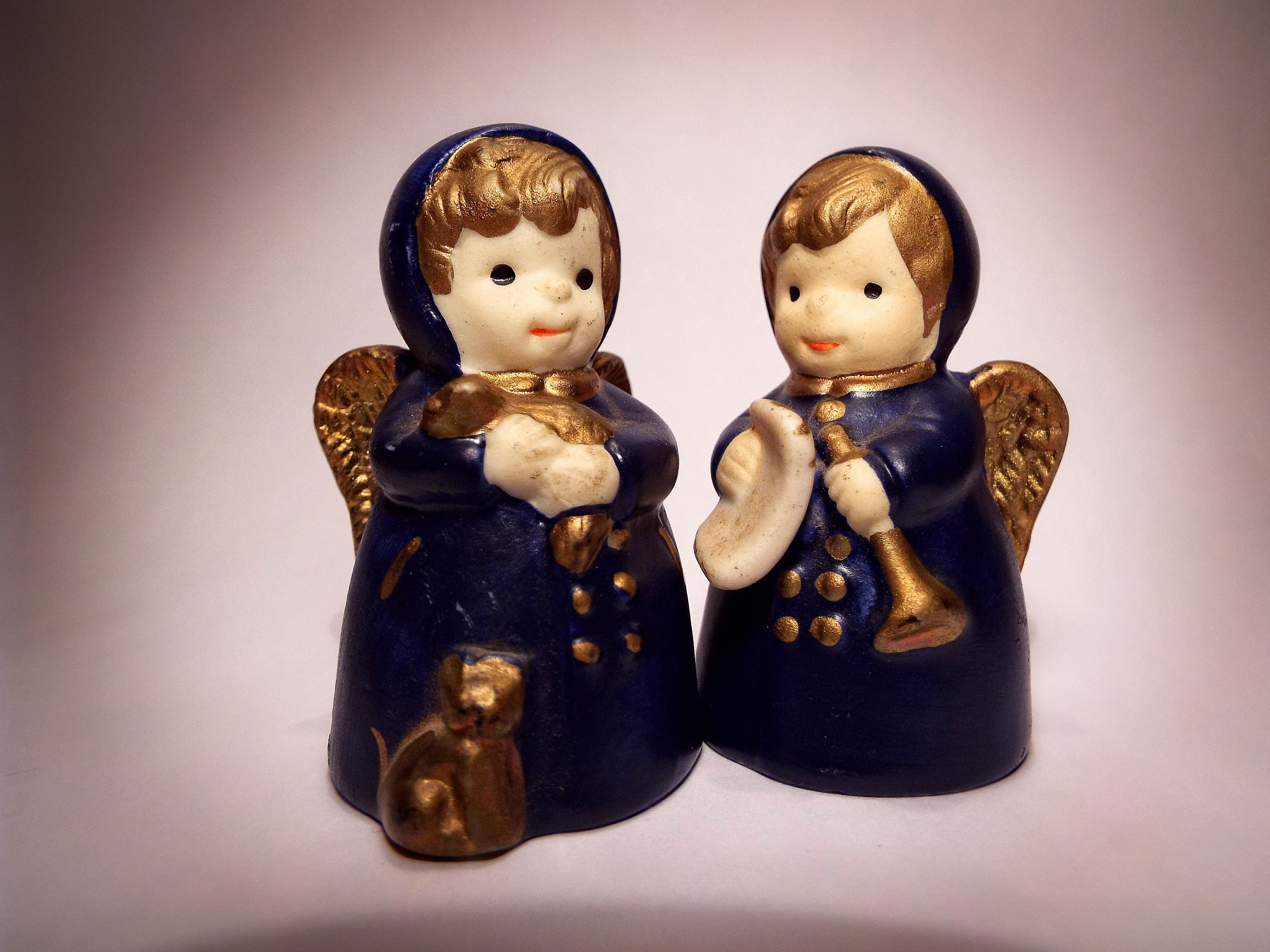 2 blue angel figurines