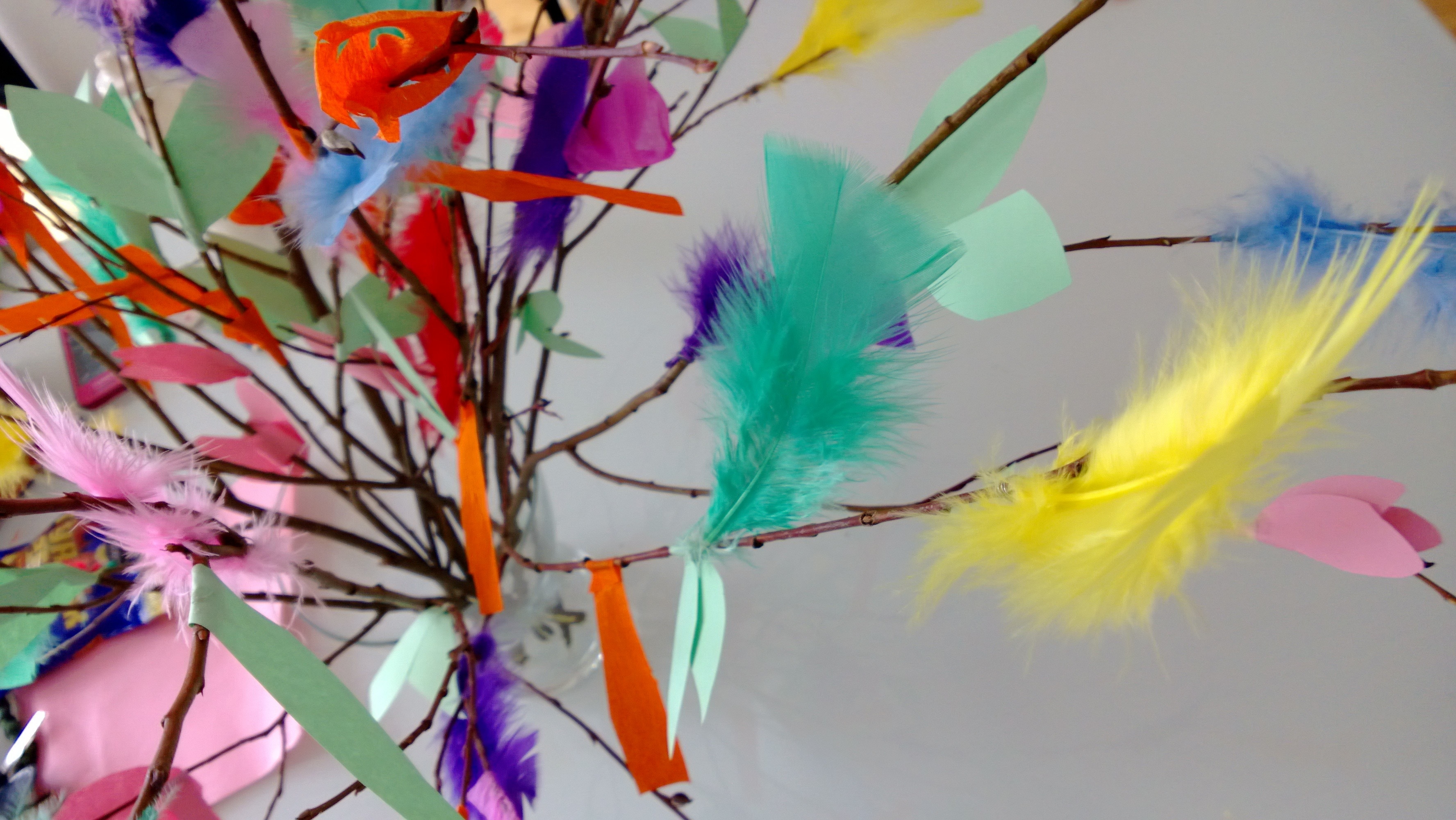 yellow green and red feather decor