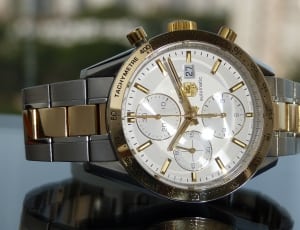 silver and gold link strap chronograph watch thumbnail