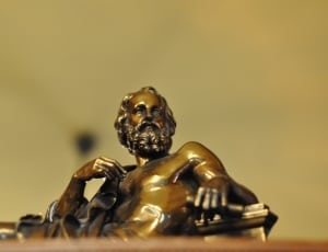 brass man figurine decor thumbnail