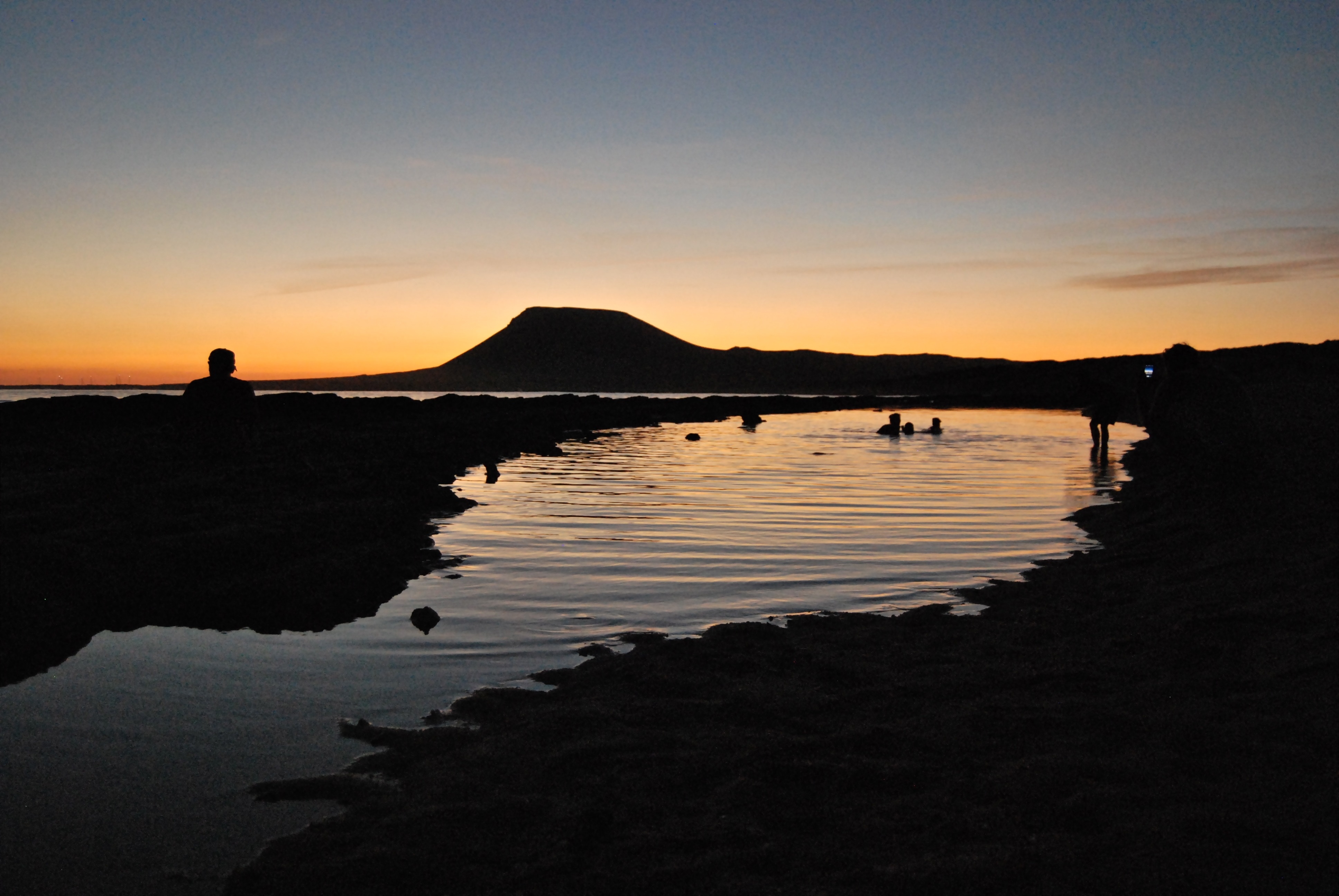 photo of lake during sunset