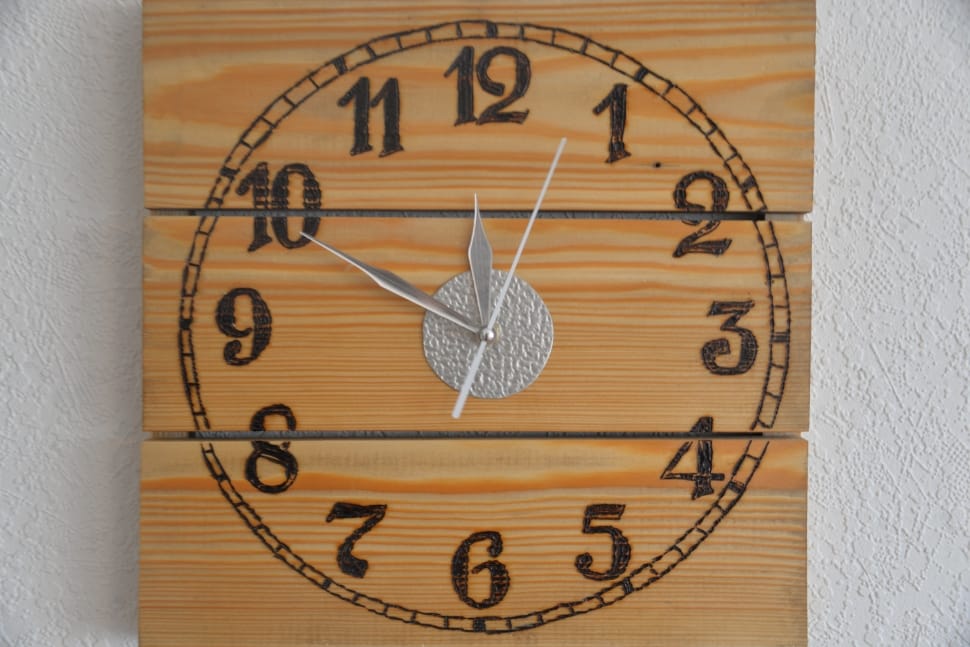 brown and black wooden wall analog clock preview