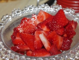 strawberry fruit and clear glass bowl thumbnail