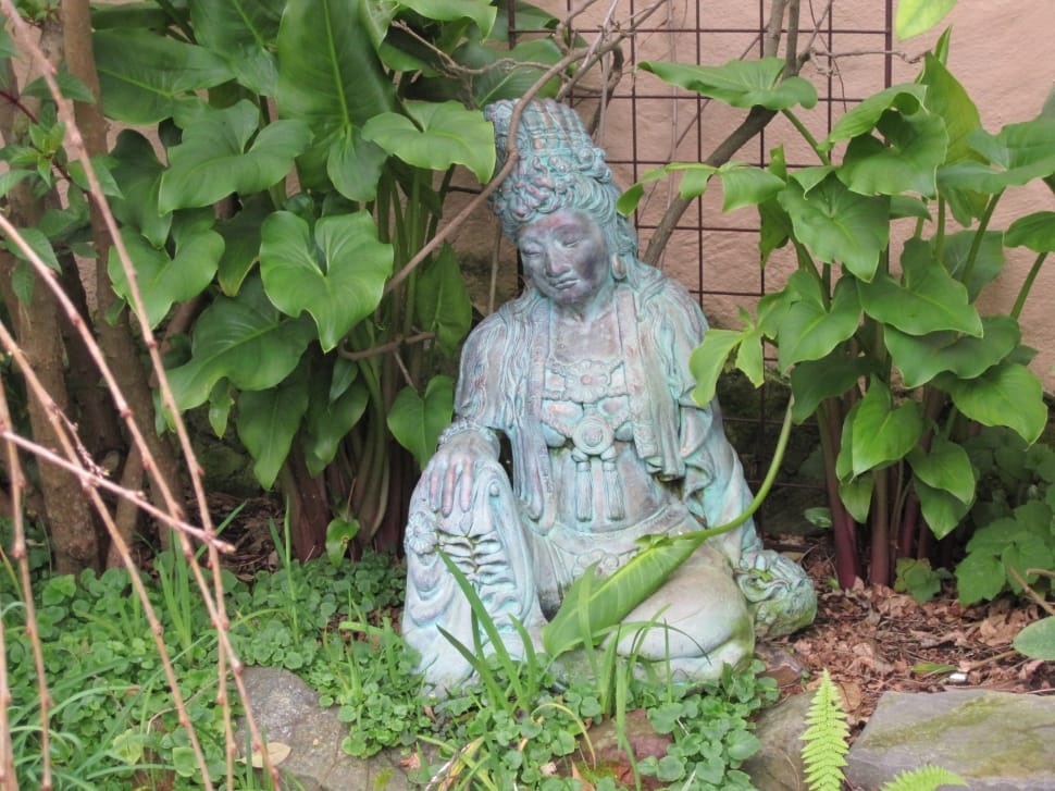 blue and gray ceramic buddha statue preview