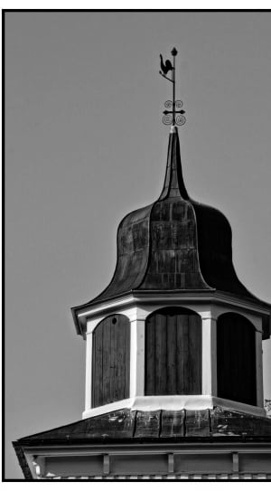 grey scale photo of tower thumbnail