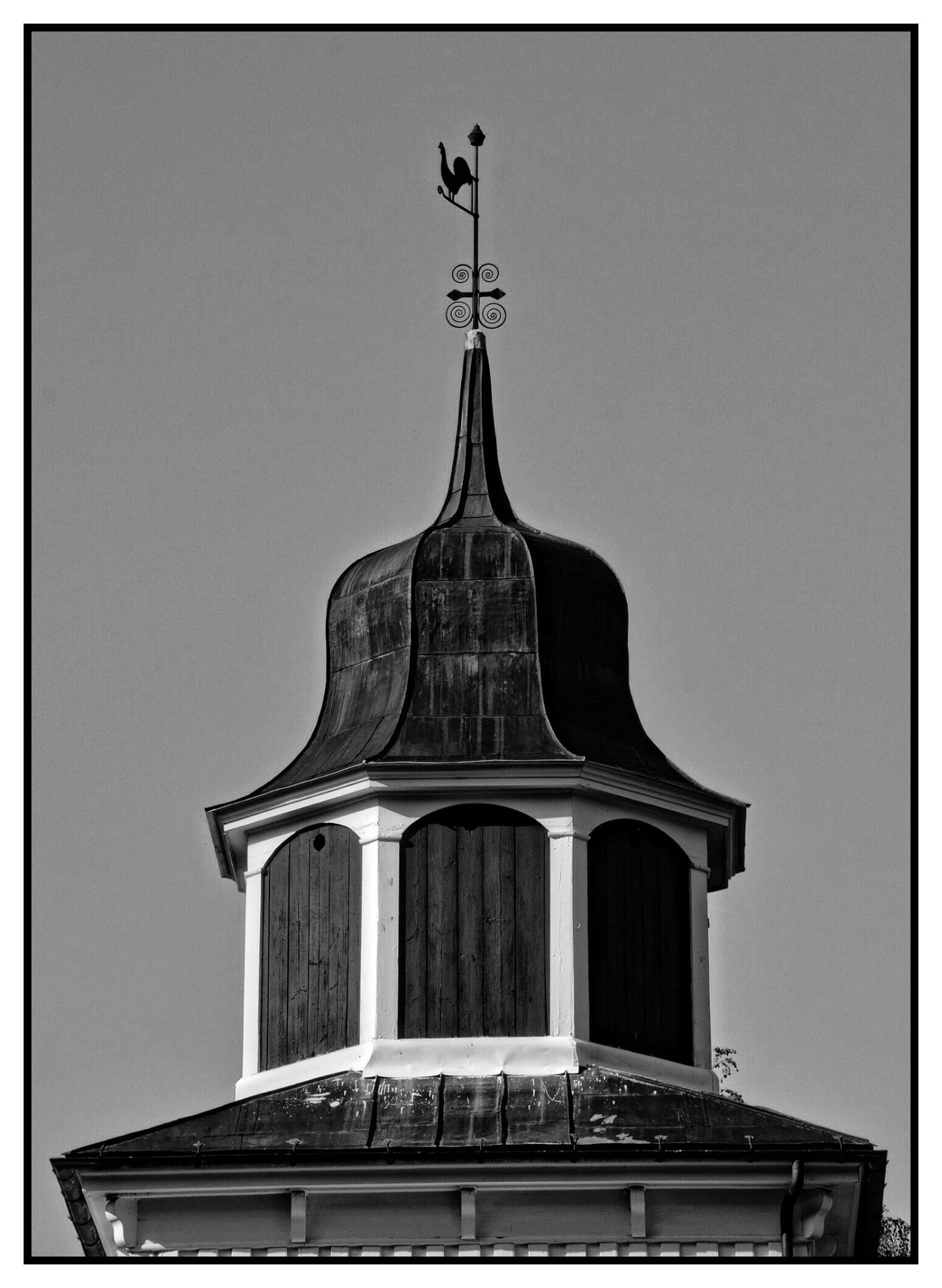 grey scale photo of tower