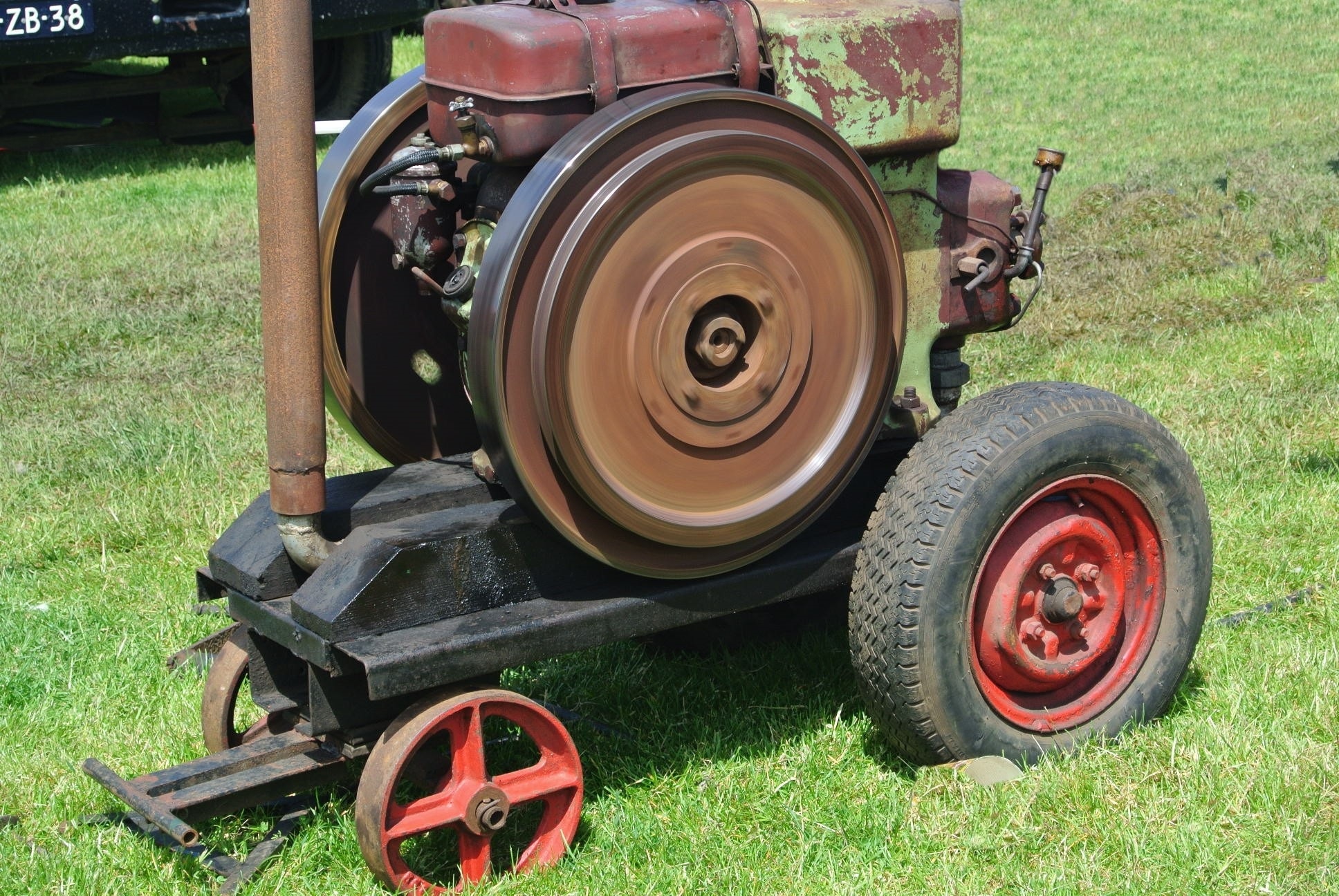 black and red lawn machine