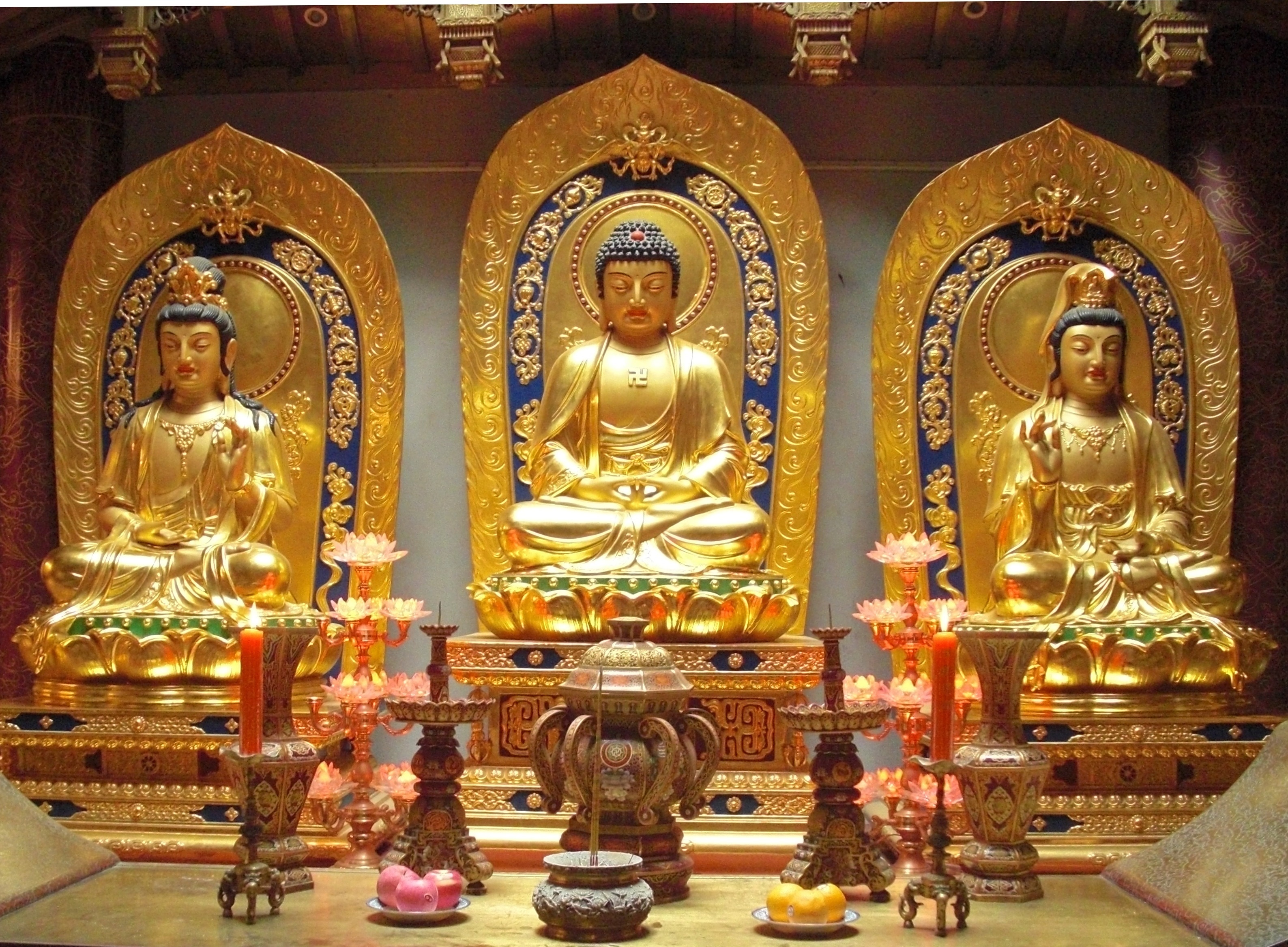 3 buddha figurines