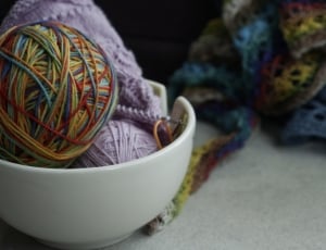 assorted thread ball in white bowl thumbnail