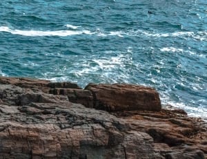 rocky cliff near beach thumbnail