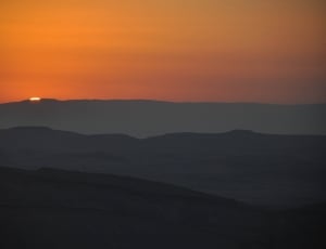 silhouette mountain range photography in golden hour thumbnail