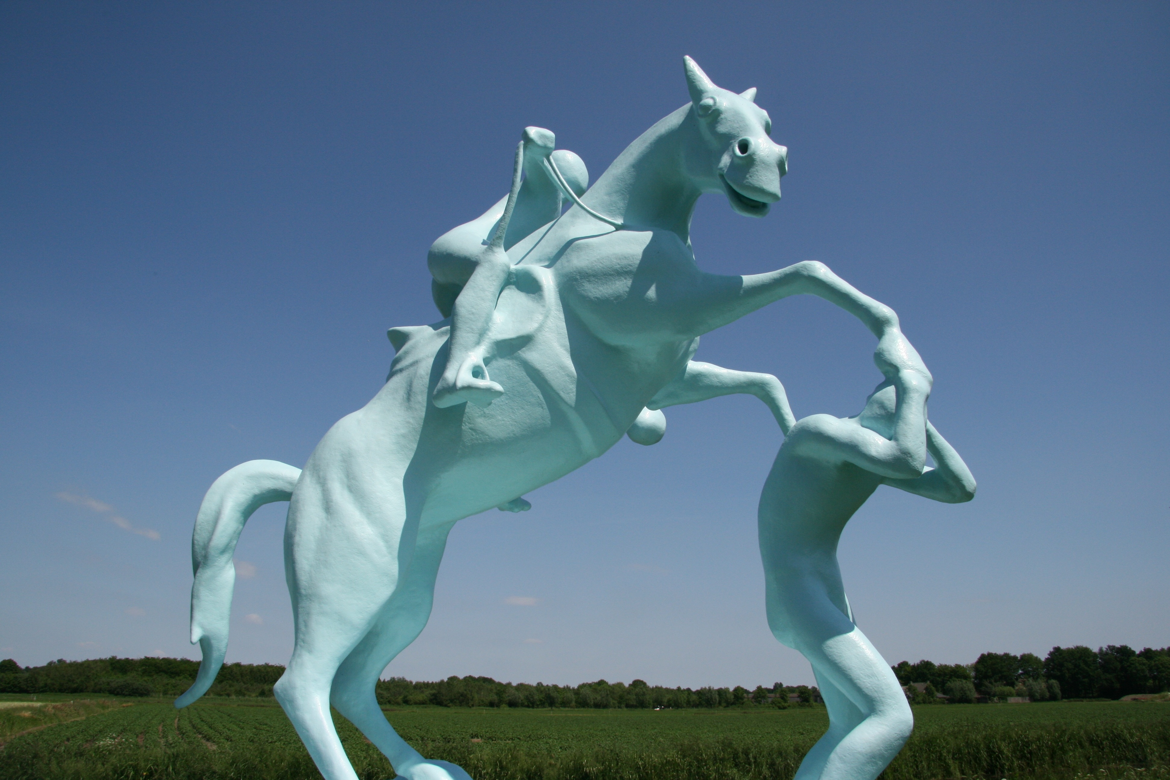 horse and man concrete statue