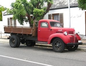 red and brown stake truck thumbnail