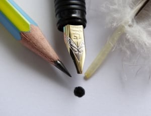 ink pen, pencil and yellow tube thumbnail