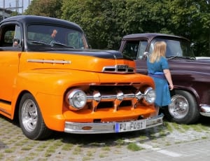 orange single cab pickup truck thumbnail