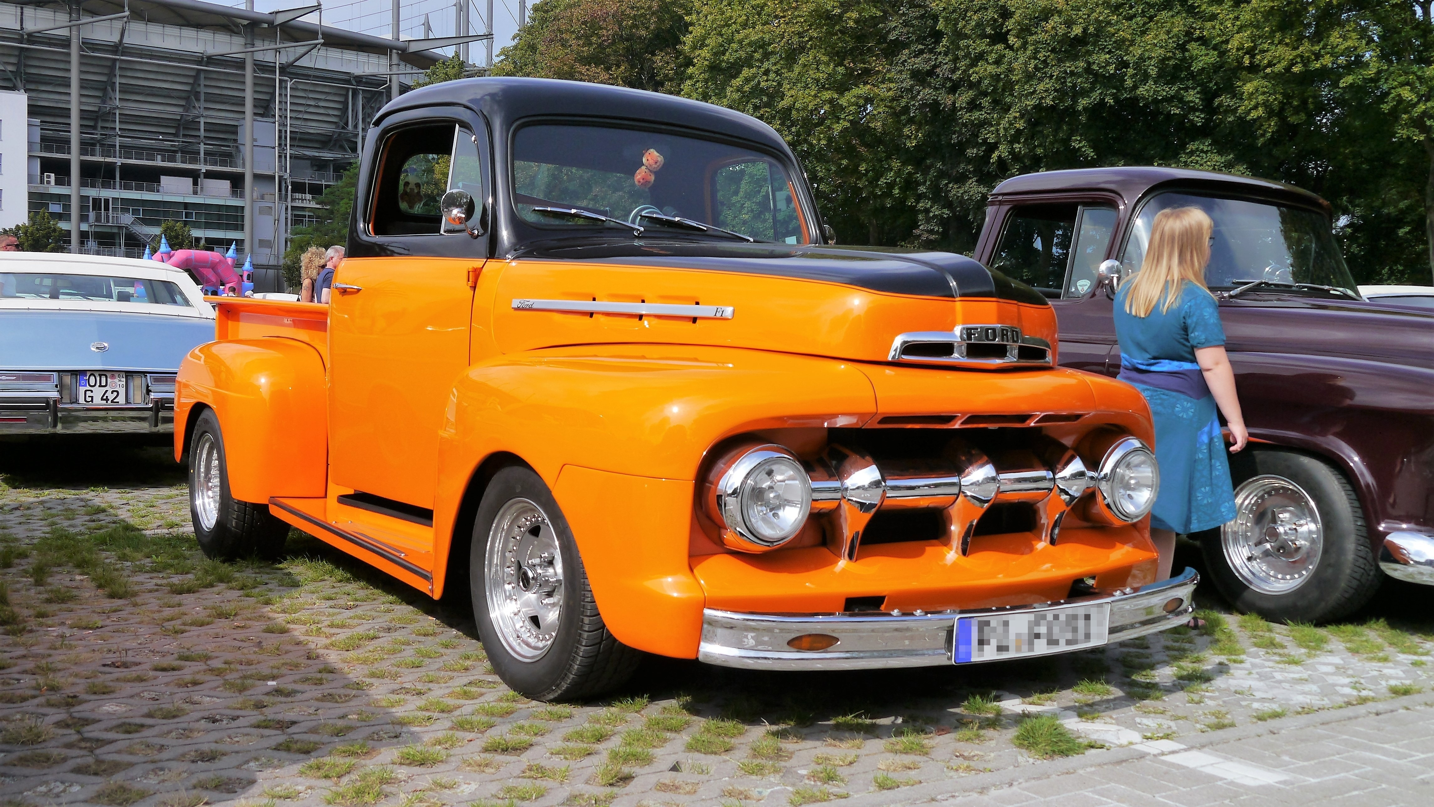 orange single cab pickup truck