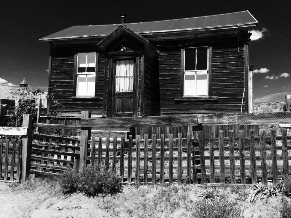 grayscale photo of wooden house preview