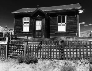grayscale photo of wooden house thumbnail