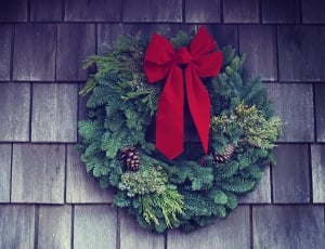 green christmas wreath with red ribbon thumbnail