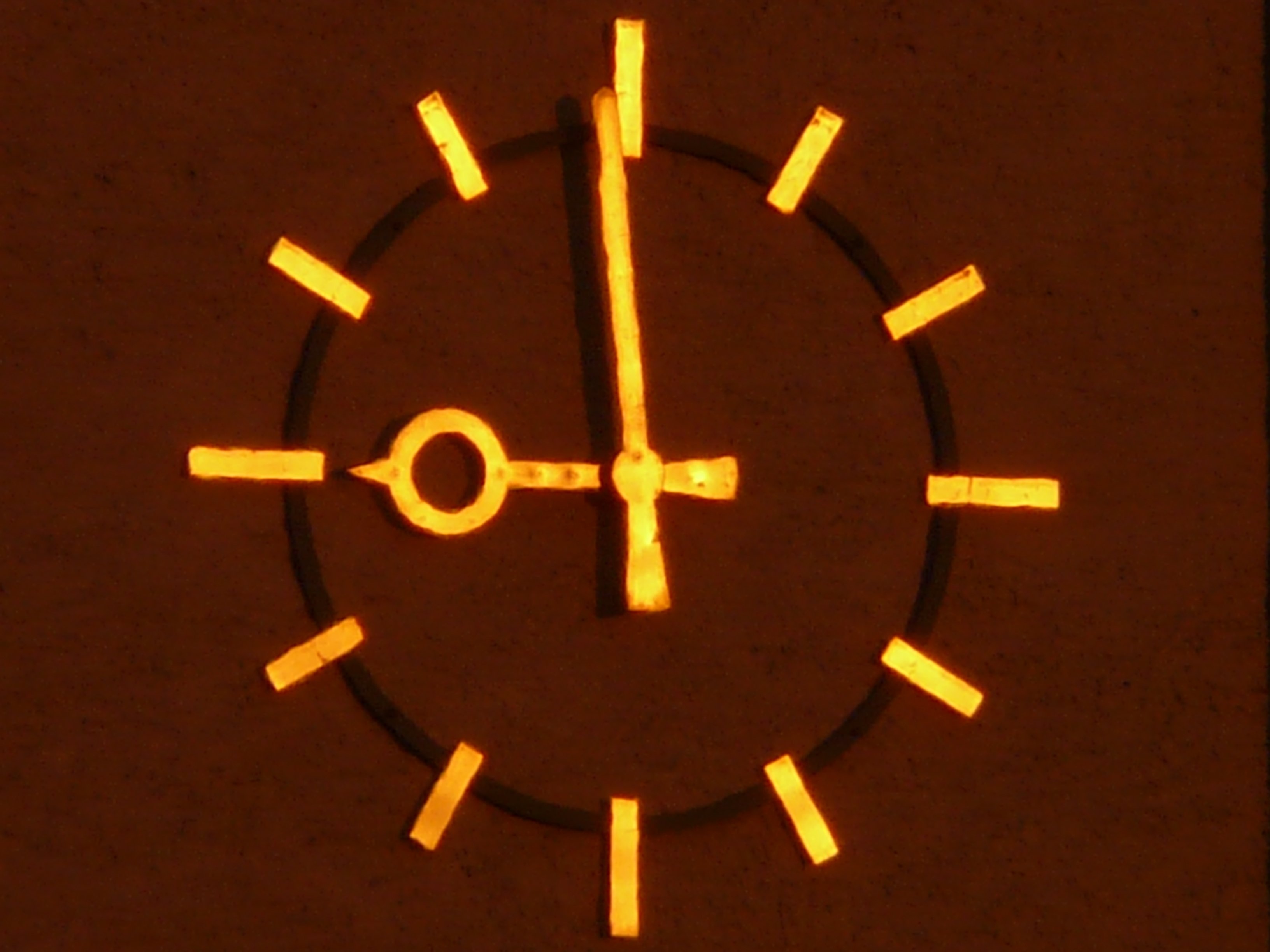 brown and black analog wall clock