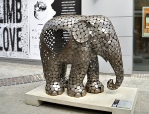 gray metallic elephant figurine thumbnail