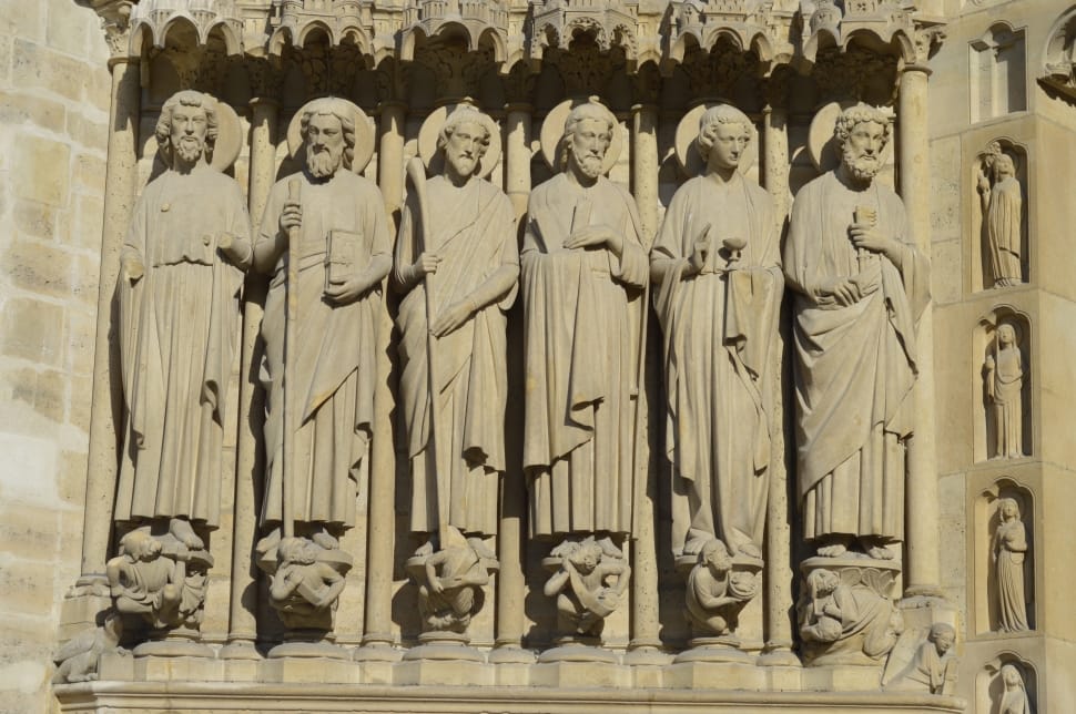 six grey concrete religious statues preview