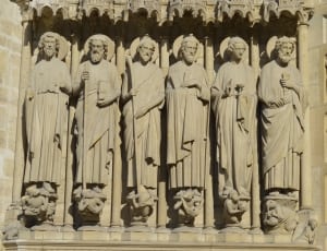 six grey concrete religious statues thumbnail