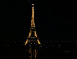 eiffel towel with lights during nighttime thumbnail