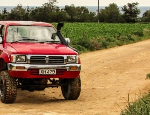 red crew cab pickup truck thumbnail