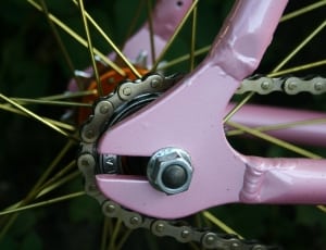 grey and pink bicycle sprocket thumbnail