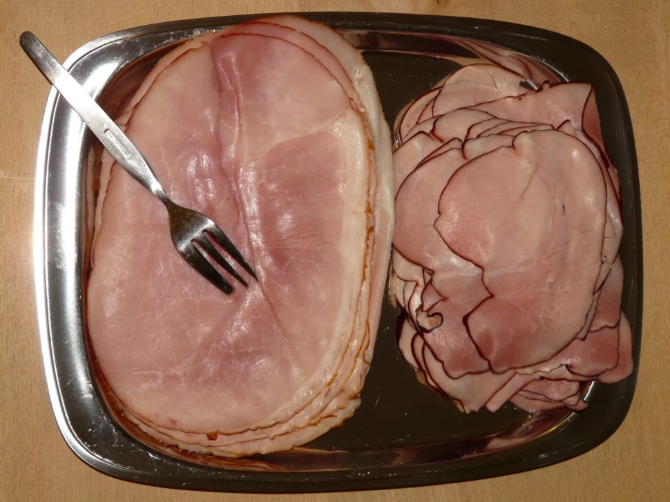 raw ham and stainless steel fork preview