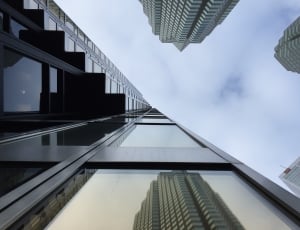 low angle photo of high rise building thumbnail