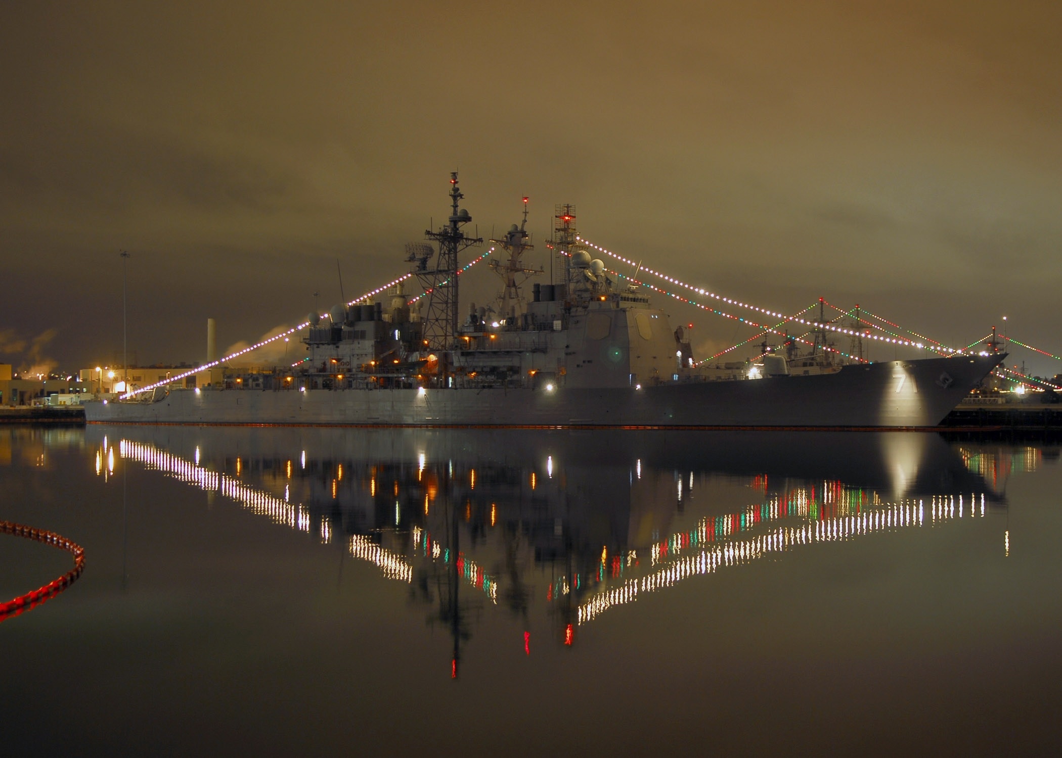 gray lighted ship on water during nighttime