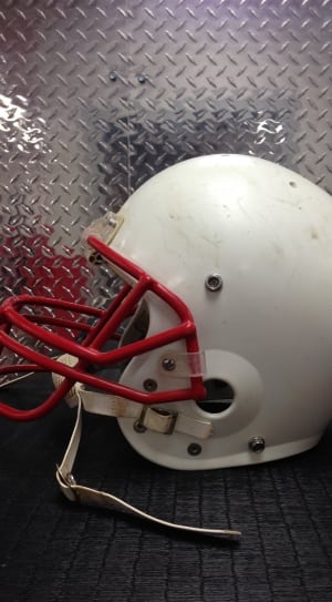 white and red american football helmet thumbnail