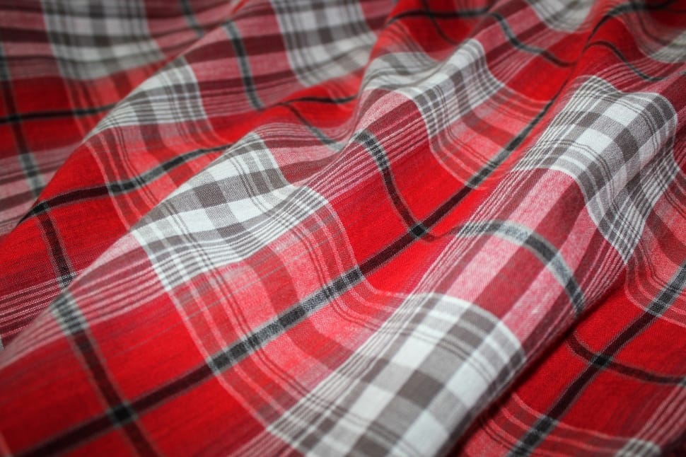 red white and black plaid textile preview