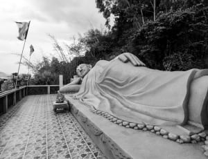 grayscale photo of reclining buddha thumbnail