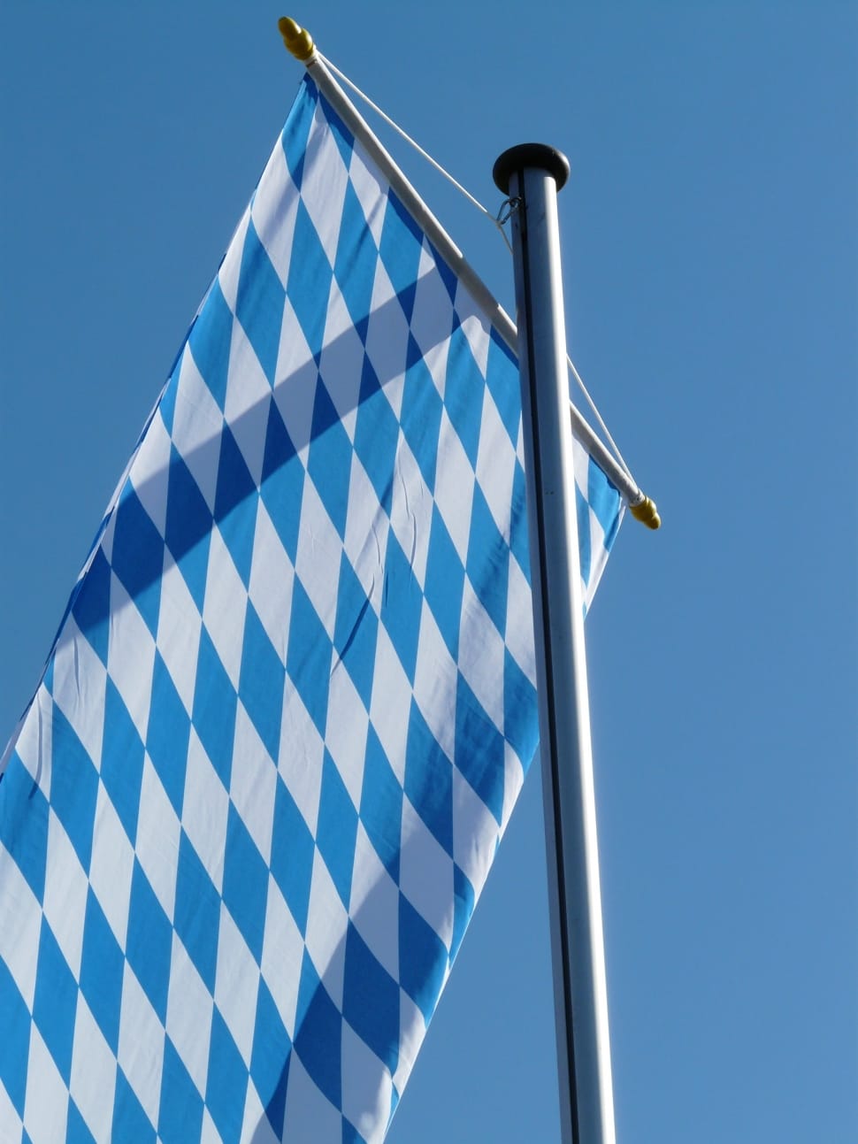 white and blue argyle flag preview