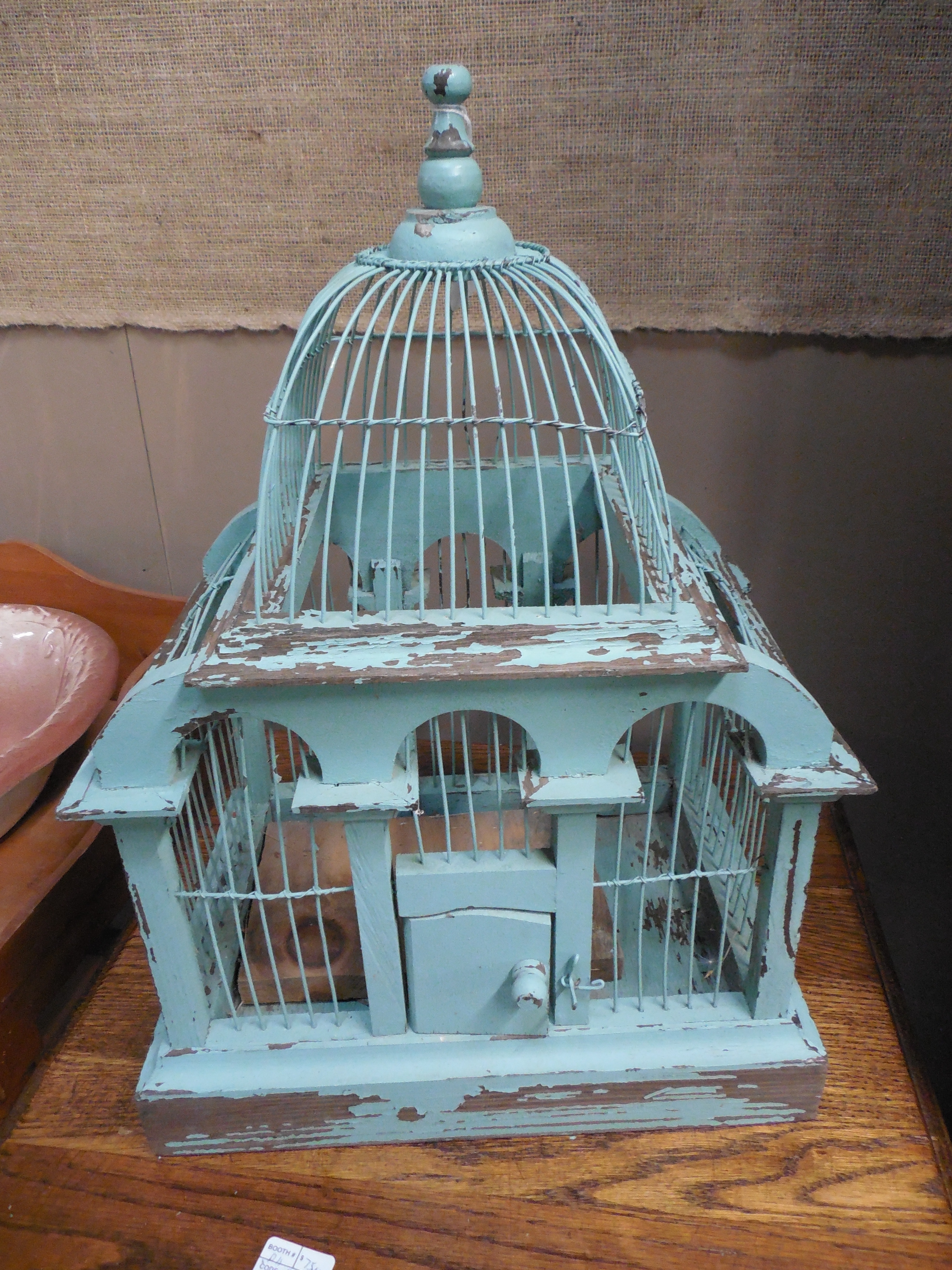 blue wooden bird cage