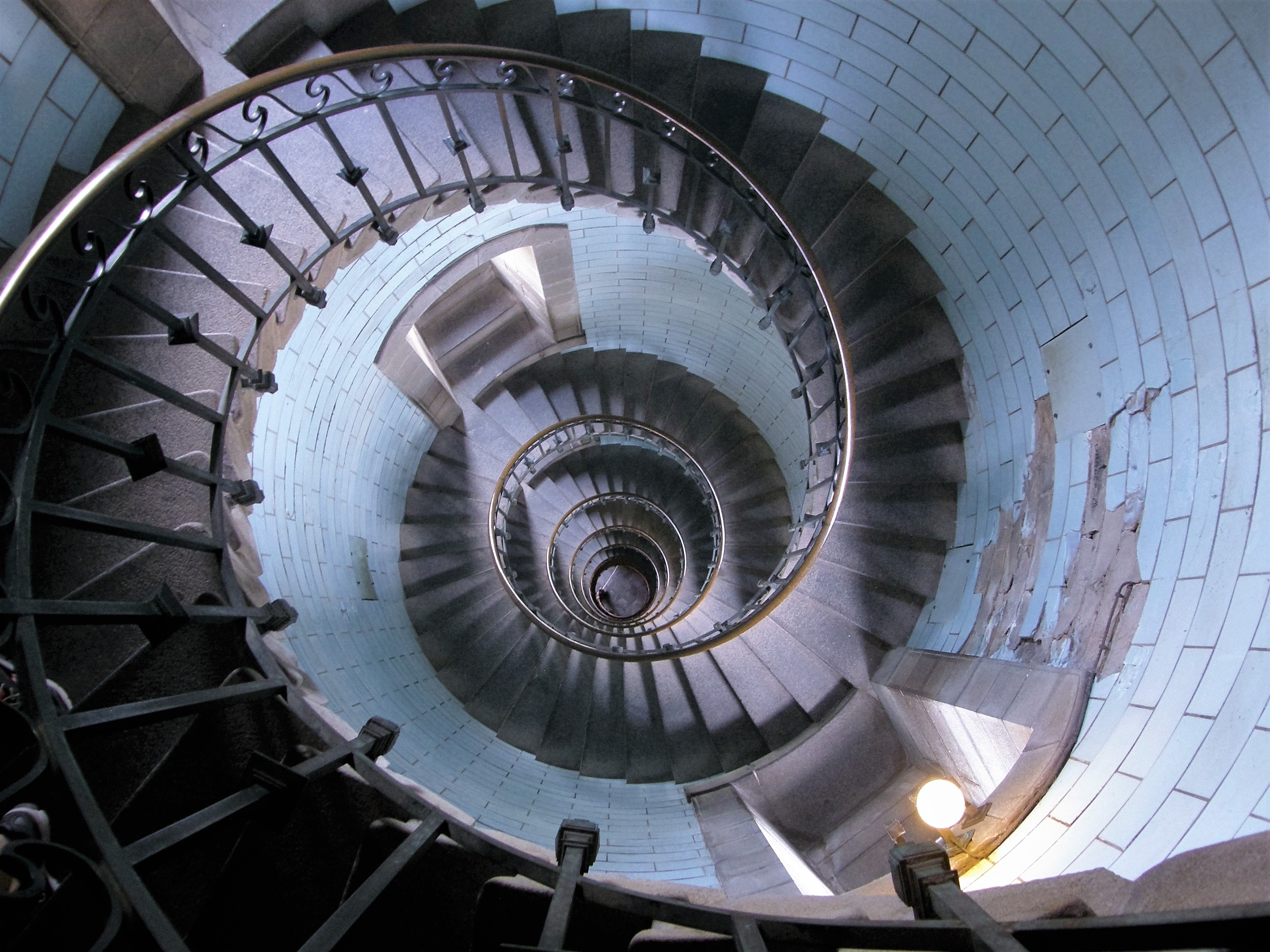 gray concrete spiral stairway