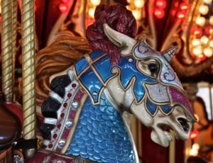 blue beige and red horse carousel thumbnail