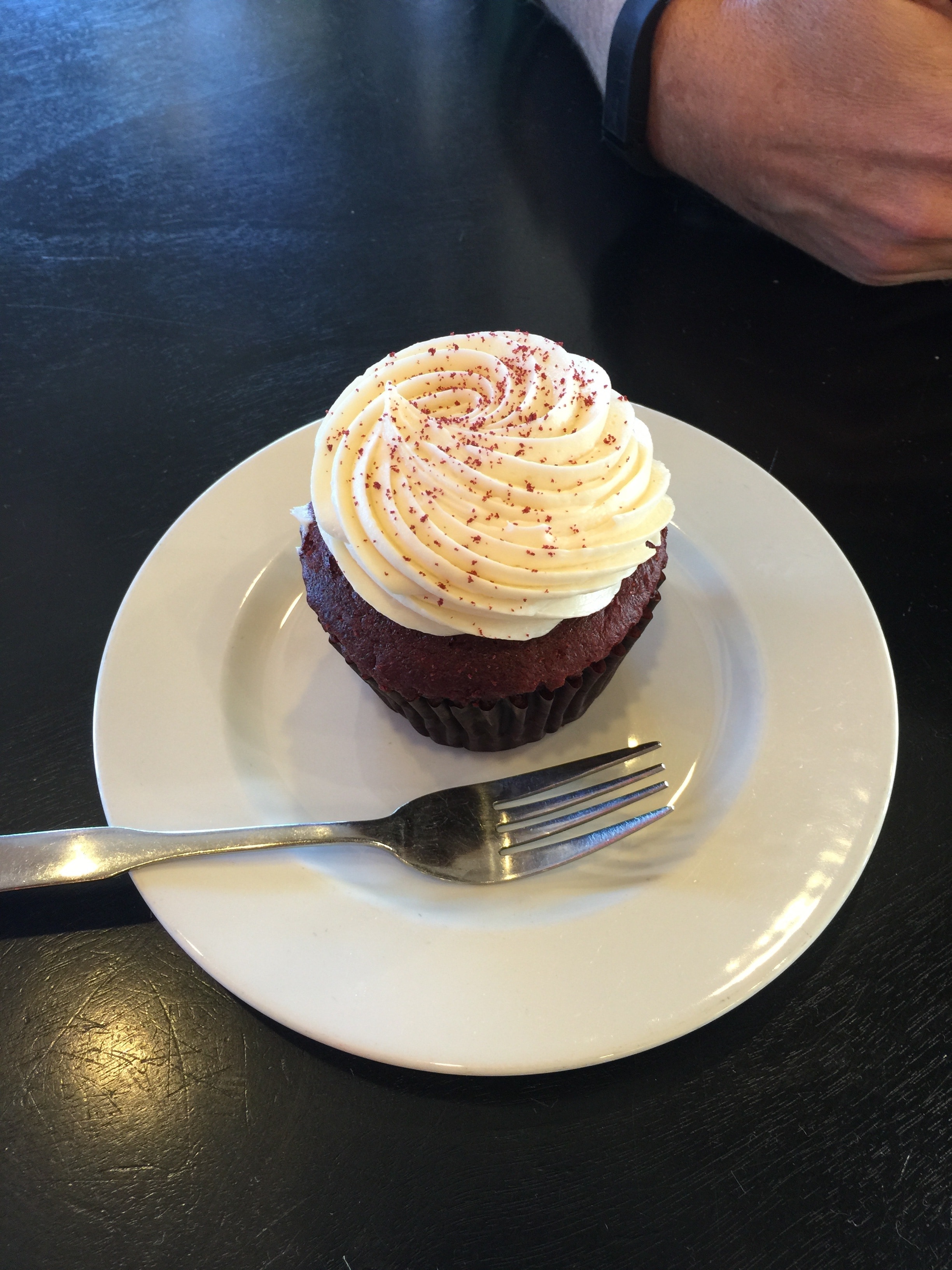 cupcake on white ceramic saucer