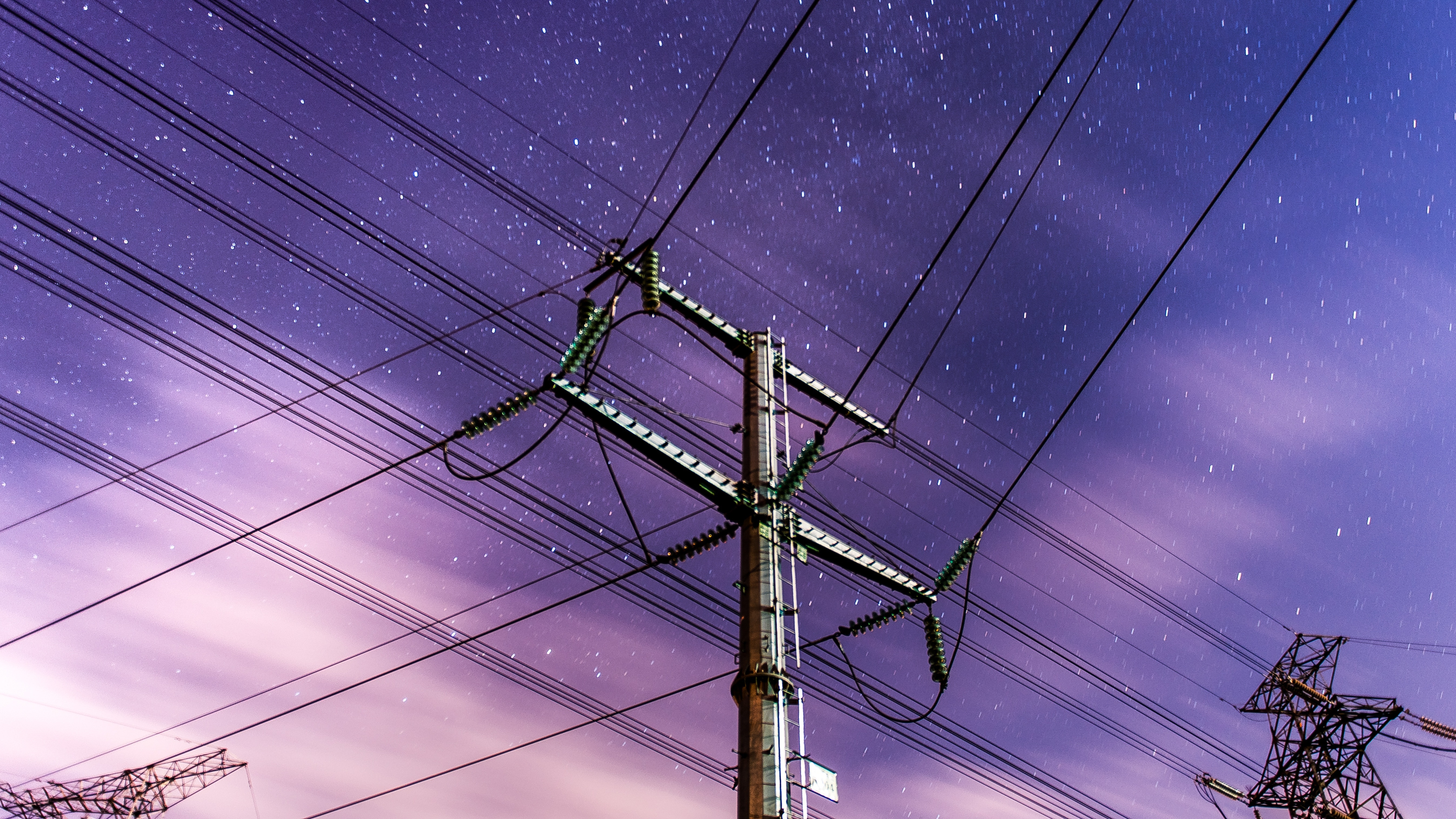 electric post under a purple sky